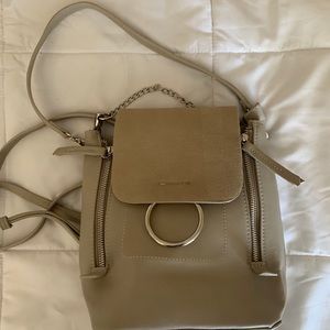 Lulu’s grey backpack